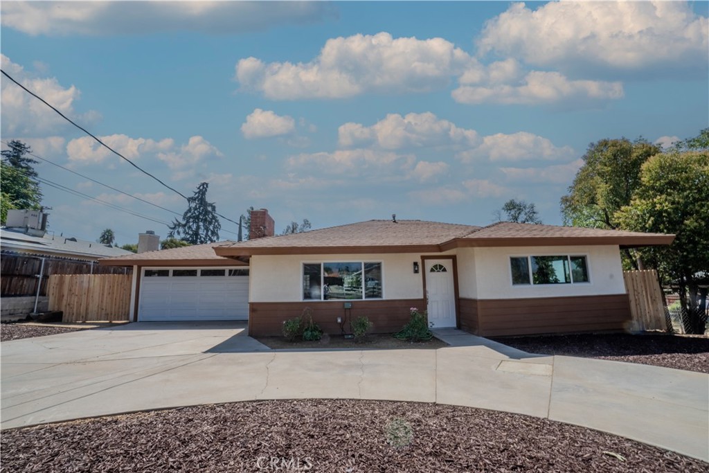 FULLY-REMODELED single story home in Upper Yucaipa. Enjoy many energy-saving features including three individual cooling/heating zones with separate remotes, LED lighting throughout the entire home, tankless water heater, and energy efficient windows. Beautiful vinyl flooring and upgraded carpet and pad in bedrooms. Quartz counters in kitchen and bathrooms. New custom cabinets throughout the home. Upgraded appliances. New shower in tub with rainhead shower. All new interior and exterior paint (stucco color coat). Wood-burning fireplace. Separate laundry room with half-bath off the covered patio. Low maintenance front yard landscaping with large circular driveway - lots of space for parking! Huge flat backyard with great potential for ADU, pool, garden, or play area. New garage door with wifi-enabled garage door opener. Epoxy floor in garage. Low tax rate - 1.288%! No HOA! Close to Uptown Yucaipa, Yucaipa Regional Park, schools and shopping. This turn-key home is ready for you to move in!