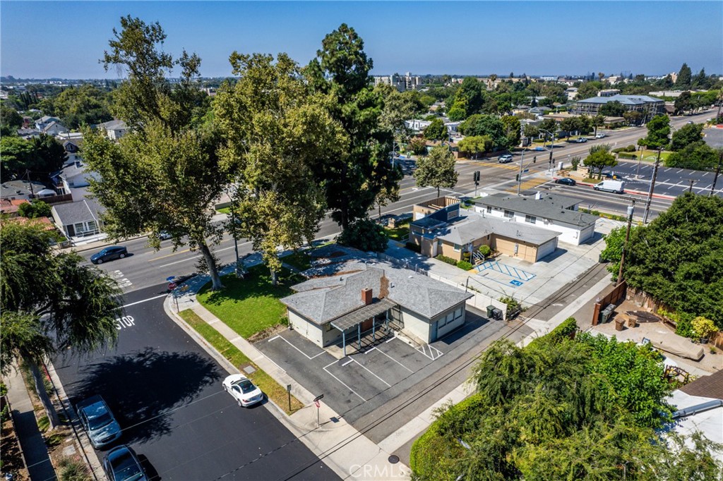 Incredible, corner lot opportunity with excellent exposure on East Chapman Avenue. Vibrant area of Fullerton close to downtown, Fullerton College, Cal State Fullerton with convenience to the 91 and 57 freeways. City Zoned 'Business Professional' with possibilities for many business types or rental opportunities. It features a reception area with fireplace, reception room and flexibility for 4 to 5 private offices. Additionally there is a kitchenette sink prep area, a bathroom, storage areas and convenient front & rear entrances. Ample parking of 5-7 spaces on site plus street parking. Long time use as a business office but flexibility to be utilized for many professional types. Located on the active, visible thoroughfare of Chapman Ave allowing very recognized signage, it is surrounded by many thriving professional buildings and adjacent to residential areas. Seize this unique opportunity and make it yours in the beautiful, bustling city of Fullerton.