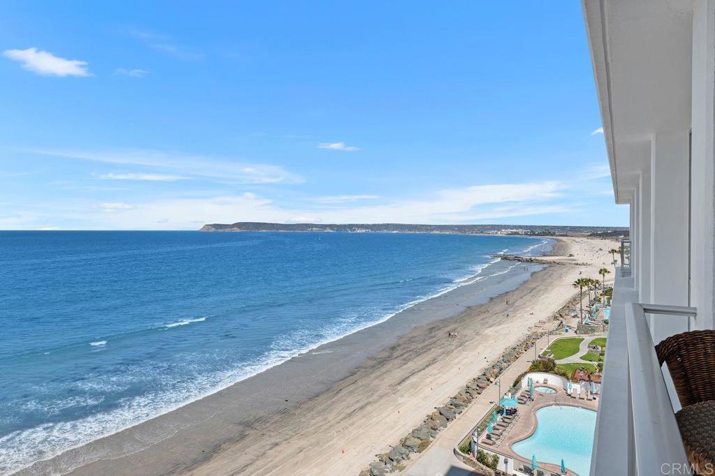 RESORT STYLE LIVING-Oceanfront Elegance with Fantastic, Ocean Front, Unobstructed, Panoramic Views of Ocean and Silver Strand Beach! This exquisite oceanfront residence combines classic craftsmanship with breathtaking scenery. Enjoy uninterrupted, panoramic ocean views from every room—including the bedroom, bathroom, kitchen, and living room. Whether you're soaking in the tub or sipping coffee at sunrise, the beauty of the coastline is always within sight. Beautiful crown molding adds a touch of refined elegance throughout the home, enhancing the architectural charm and creating a polished, timeless feel. The open-concept layout is perfect for both relaxing and entertaining, with large windows and glass doors that flood the space with natural light and frame the spectacular view like a work of art. Experience the luxury of coastal living in a home where comfort meets sophistication and every detail is designed to impress. AMENITIES INCLUDE: POOLS X 4 TENNIS X 8 PICKELBALL COURT HEALTH FACILITIES X 2 SPECIAL EVENT ROOM