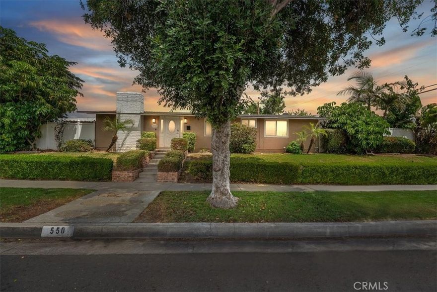 Welcome to this beautifully maintained 3-bedroom, 2-bathroom mid-century home, nestled on an expansive corner lot in one of La Habra’s most desirable neighborhoods. From the moment you arrive, you’ll be captivated by the exceptional curb appeal and the lovingly landscaped grounds that set this home apart.



Inside, natural light pours into the bright and airy living room, where soaring Tongue and Groove wood cathedral ceilings create a stunning architectural statement. The home offers a perfect blend of timeless charm and modern updates, including fresh interior and exterior paint, and stylish laminate and tile flooring throughout. Upgraded with a 200-amp electrical panel, a 70-amp subpanel in the garage, and high-speed fiber internet, this home is ready for today’s lifestyle.



Step outside and you’ll discover your own private garden retreat. The backyard is a true paradise, featuring a shaded pergola and a lush, rolling lawn surrounded by an incredible array of mature, fruit-bearing trees—including Fuji apple, persimmon, papaya, banana, sugarcane, kumquat, Meyer lemon, honey tangerine, Mexican lime, Valencia orange, tangelo, grapefruit, Caribbean blood grapefruit, and more. Whether you're sipping your morning coffee under the pergola or entertaining guests, the outdoor space offers peace, privacy, and a bounty of nature’s gifts.



Ideally located near shopping, dining, and parks, this home is the perfect blend of comfort, character, and California living.