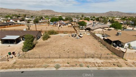Photo of 58874 Delano Trail, Yucca Valley, CA 92284 (MLS # JT26078029)