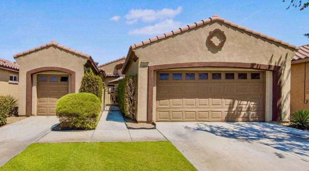 Photo of 49668 Minelli Street, Indio, CA 92201 (MLS # 219141509DA)