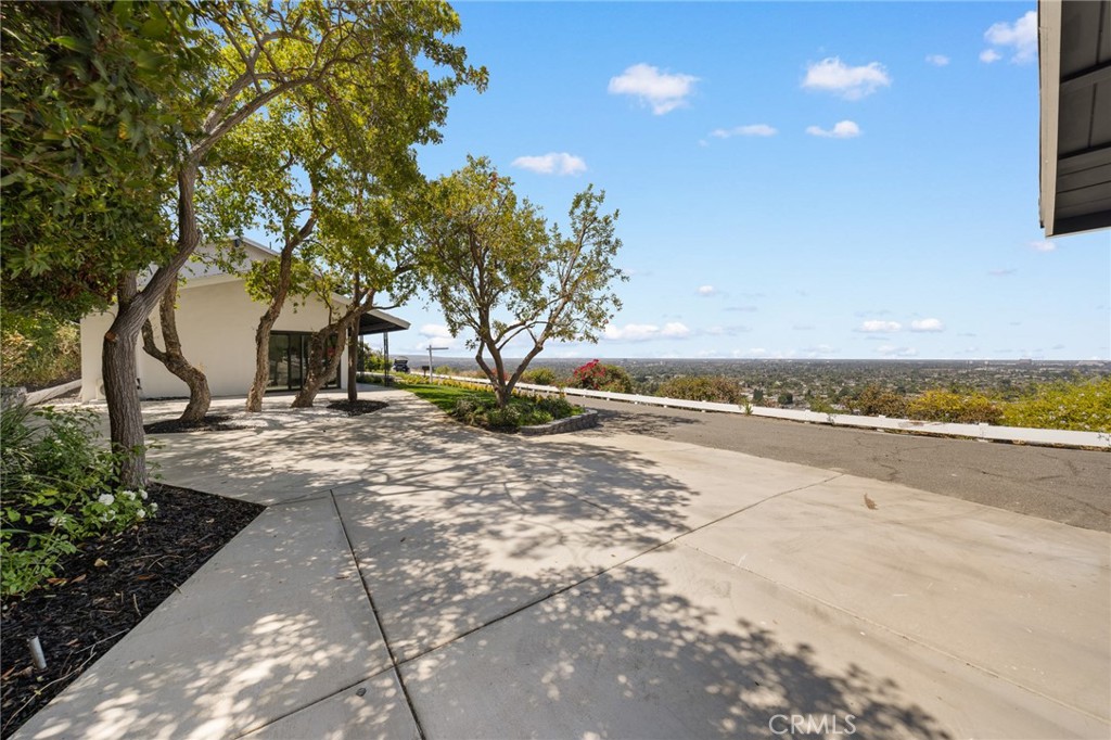 **Price Reduced**Time to Buy, Panoramic Heights Estate, Luxury Living with Ocean & City Views, 2025 Fully Renovated, Nestled in the prestigious, Panoramic Heights community, this stunning Fully Furnished 4-bedroom, 3-bathroom home sits on nearly half an acre of meticulously landscaped grounds, Sell as Model Home, including everything, offering 180° unobstructed views of the Pacific Ocean, downtown LA skyline, and twinkling city lights. Sophisticated Living Spaces, Main-level primary suite, Perfect for multi-generational living, guests, or a private retreat, Three additional bedrooms upstairs, one of the spacious bonus room(ideal as a 4th bedroom, home office, or media room). Year 2025 full renovation featuring high-end finishes, brand-new appliances, and designer bathroom fixtures—a seamless blend of modern luxury and comfort. Stunning Outdoor Oasis, Professionally designed front & rear gardens by a premier landscaping team, inspired by classic American traditional courtyard style, elegant, low-maintenance, and timeless. Expansive frontage with manicured greenery enhances curb appeal, while the rear garden offers a serene retreat with panoramic views. Bright, Airy & Move-In Ready, Flooded with natural light, this home’s open layout frames postcard-worthy views from nearly every room. Enjoy effortless indoor-outdoor living, perfect for entertaining or unwinding in your private paradise. A rare opportunity to own a turnkey estate with endless potential in the heart of Orange County—where luxury, comfort, and breathtaking scenery unite. Most desirable location, minutes away from Angel Stadium, Disneyland, Orange Hill Restaurant, Golf course, local schools, Multiple Parks, Hiking trails, and much more. Must See.
