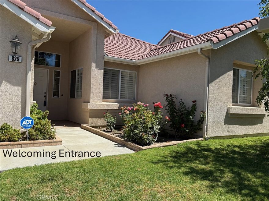Welcome Home, to this beautiful home located in the 55+ gated community THE ESTATES! Amazingly large floor plan at 1,720sqft.  2 bedroom + den could be 3rd bedroom as listed on assessor records or office space, library or craft room, whatever you desire. The open floor plan is filled with natural light, high ceilings, a large Living Room with a gas fireplace perfect for entertaining or cozy winter time. The kitchen offers plenty of cabinet and counter space, a walk-in pantry and an eat in breakfast/dining area. This beautiful home includes a formal dining area as well. The master suite features a cozy gas fireplace, separate access to backyard along with, private bath with walk-in shower, a very large vanity with dual sinks and his and hers walk-in closets. The roomy entry-way closet plus linen cabinets provide ample storage and it includes indoor laundry. The 2 car attached garage has extra side space for additional storage. The backyard has a spacious covered outdoor patio area great to enjoy coffee or tea while watching the hummingbirds in the honeysuckle tree, included is your very own orange tree.

This gated community is peaceful with beautiful green grass and easily accessible walking paths. Your HOA includes a roomy club house for activities and social time, a beautiful pool where you can spend time with friends and family.  You can keep as busy as you would like to be in this active community.  Conveniently located near shopping, dining, healthcare and recreational areas. A few additional perks low HOA, taxes and RV parking available onsite.

This home combines security and lifestyle in one package so, hurry submit your offers today before it's gone so you can live and enjoy your life in this wonderful active community at THE ESTATES amazing 55+ gated community!