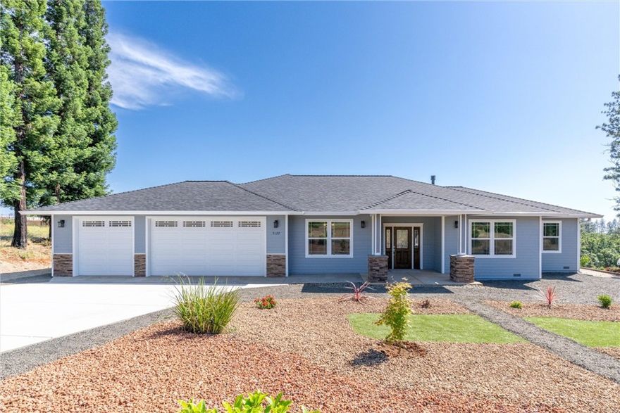 Don’t miss this newly constructed home located in a desirable neighborhood not far from Lake Oroville. 
-This lovely home features 2,197 sf of living space with 3 bedrooms PLUS den/office AND a formal dining room. Other notable features include an open-floor plan with SPLIT BDRM design, luxury vinyl plank flooring with carpeted bedrooms, vaulted ceilings and perfect location for outdoor activities.  
-Making meals with family and/or friends is a breeze in the spacious open kitchen featuring granite countertops, huge island breakfast bar, multi-function farmhouse sink, 2 PANTRIES, loads of cabinet storage, soft-closing hardware, pull out cabinet drawers, dishwasher, garbage disposal, microwave and gas oven/stove.  
-The spacious ENSUITE PRIMARY bedroom features a walk-in closet, bathroom with separate tiled shower, a large 3’ x 6’ soaking tub, double sinks with quartz countertops, a vanity and a private water closet with storage cabinets. 
Both guest bedrooms, located opposite the primary bedroom, feature walk-in closets, ceiling fans, carpet & custom lighting, dedicated bathrooms with one having an ENSUITE GUEST BATH.
-The laundry room, with garage entry, features storage cabinets, gas OR electric dryer hook-ups and folding counter with granite surface. A utility sink is located in the garage next to the laundry room which makes for easy cleanup before entering the home.  There is plenty of parking in the huge 3-car (25'x 32') garage with 8' doors and space for a work bench or extra storage.
-Outdoor entertainment can be enjoyed on the covered redwood deck patio over-looking the backyard with distant mountain views. The large backyard is ready for your finishing touches and can accommodate a shop, pool, RV parking, huge garden or almost anything your heart desires. A second driveway exists allowing easy access to the backyard and/or additional parking.  
-This amazing home sits on .63 acres, in a cul-de-sac location and a much-desired area on the lower outskirts of Paradise. 
Recreational activities such as kayaking, fishing, water skiing, hiking, trails, shopping and much more are close by. Located 8 minute drive to Lake Oroville Marina and 18 miles to Chico make this property close enough to most activities yet far enough away from it all to live in serene Paradise.  
Be the first to live in this beautiful home and enjoy all that the area has to offer.