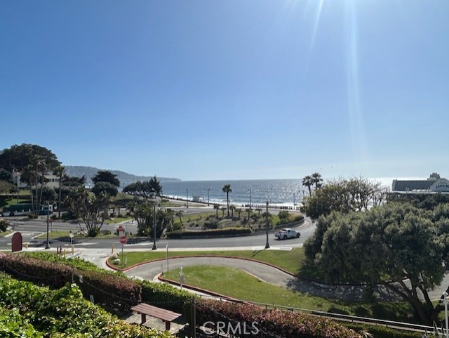 LOWEST PRICED UNIT IN PROJECT! GREAT BEACH LOCATION. Enjoy Ocean Views, Colorful Sunsets, and the Ocean Breezes. Spacious 1 bedroom 1 bath first floor unit with open floor plan walk-in closet, a generous private balcony off both living room and bedroom, and tandem parking for 2 cars. Located in a resort like condo project with 2 pools, hot tubs, BBQ's, fire pits, fitness center, and laundry facilities, and beautiful landscaping. The Redondo Beach Pier, beach bike and walking paths, veterans park, and restaurants are all just a few steps away. First time on the market in over 40 yrs. This a rare opportunity with a little TLC make this your dream escape and live walking distance to the beach and pier. Condo project is approved for VA and FHA financing.