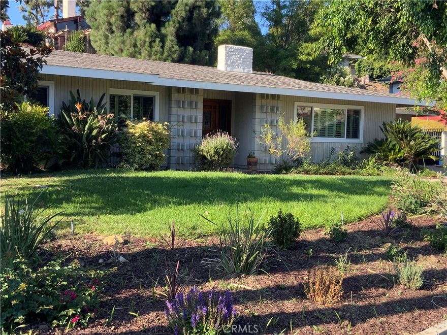 This beautiful single-level four bedroom home is located at the end of a very quiet cul-de-sac in the Sunset Hills subdivision. This home has had only one owner for 63 years. The neighborhood is comprised of all single level homes. The large living room has enough space for a grand piano. The kitchen and dining room offers tremendous amount of cabinet storage. The kitchen has a double oven with convection, a new gas cooktop, and a new dishwasher. One bedroom has been used as a home office and has a built-in desk, cabinets, and book shelves. The room could easily be restored as a bedroom. The large front bedroom has a beautiful view of the Hsi Lai Temple. The windows in the home are newer energy efficient dual-paned windows.  The property has a very large beautifully landscaped 13,142 sqft lot that is a gardener’s paradise. There are mature trees and many blooming plants that attract Hunninbirds and other pollinators. There is a very large 60+ year old Canary Island Pine in the rear yard. There are three large gorgeous  Jacaranda trees that bloom in June of each year. The landscaped hill in the rear yard provides great privacy as well as color in the Spring when it blooms. The covered patio is great for entertaining or relaxing with a view of the beautiful rear yard. About a third of the rear yard is separated by a fence. This separated area with grass has many possible uses: it can be used as a children’s yard (there is still a Tetherball pole from the days of young kids), a dog’s yard, for raised-bed gardening, a rose garden, or maybe an area to build an ADU (aka a granny flat). Hacienda Heights has very good schools.  This home would be a great primary residence or investment property for long or short-term rental. This property is ready for you to add your touches and make it a home. Now is a great time to buy a home. Request a showing to see this beautiful home today!