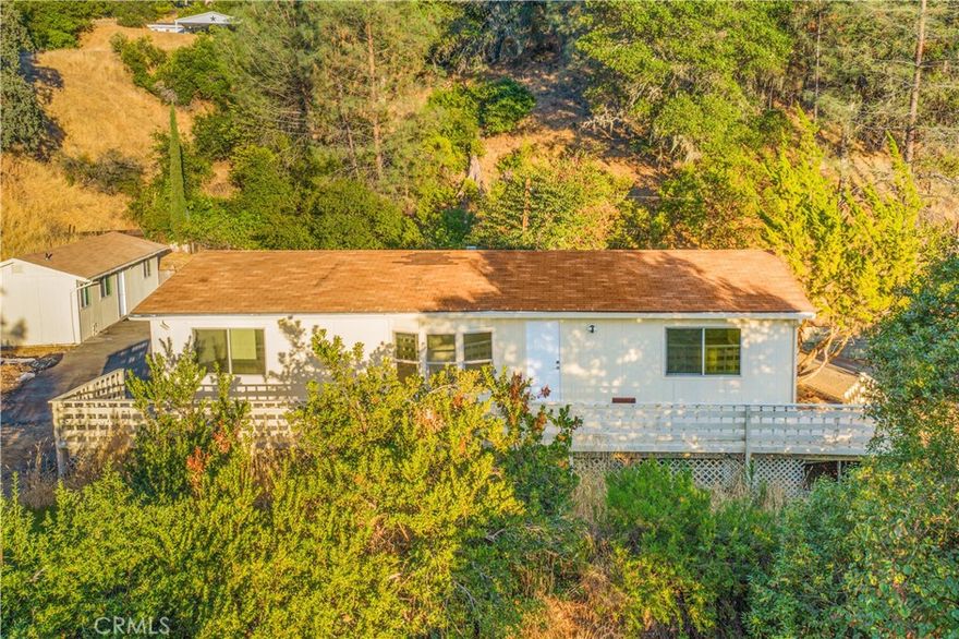 Recently remodeled manufactured home tucked away at the end of the road. Updates include new laminate flooring, fresh interior paint, and select new windows. Offering excellent investment potential with two separate rental opportunities—live in one unit and rent out the other. The spacious back deck is perfect for relaxing while taking in the beautiful western sunsets. A rare find at this value!