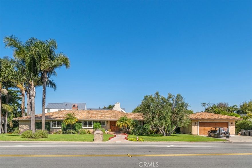 Welcome to the ultimate in coastal living and indoor-outdoor luxury in one of Newport Beach’s most coveted enclaves — the Cliffhaven neighborhood in the prestigious Newport Heights community. Situated on a sprawling 12,500+ sq ft lot, this 5-bedroom, 4.5-bath single-level estate features a rare combination of space, privacy, and resort-style amenities, including a tropical backyard retreat with pool, spa, and built-in BBQ—perfect for year-round entertaining.



This thoughtfully designed home includes two full primary suites, each with walk-in closets and beautifully appointed bathrooms—one featuring a soaking tub and walk-in shower. One of these primary suites is on the opposite wing of the house. This can be used as a private guest or in-law quarters, offering separation and flexibility for multi-generational living, guests, or work-from-home comfort. With over 3,600+ sq ft of single-level living space, you'll also enjoy luxury vinyl plank floors in the bedrooms and main living areas, a spacious formal living room, family room with wet bar, wine fridge, and wine rack.



The chef’s kitchen is equipped with top-tier appliances, including a Viking range, Sub-Zero refrigerator, stainless steel microwave and dishwasher, and a central island with breakfast bar seating—perfectly positioned to host and serve with ease. The home’s elongated driveway and 3-car garage offer both ample parking, storage and convenience, rounding out this truly exceptional property.



Step into the private, gated backyard oasis with lush landscaping, sparkling pool and jacuzzi, and abundant space for outdoor lounging, dining, and recreation. This is Southern California outdoor living at its finest.



Ideally located just minutes from Pacific Coast Highway, Newport Harbor, and the beach, this home is also close to the boutiques and restaurants of 17th Street, top-rated schools, and within a short drive of John Wayne Airport (SNA) for easy access anywhere. Whether you're seeking a private sanctuary or an entertainer’s dream, this single-level Cliffhaven gem delivers it all.