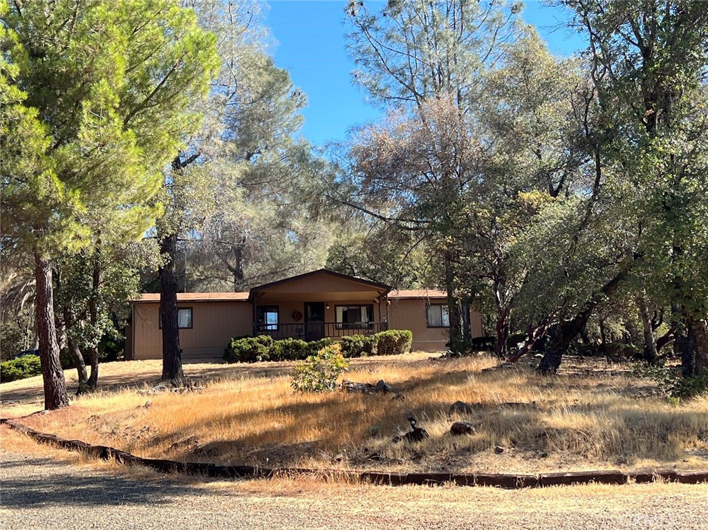 One of a kind property !! 25 acres, 6 garages, almost 2 miles of cleared trails, meadow, garden area, and a koi pond!!! PRIVATE OASIS with beautiful valley views and city lights. Home has 3 bedroom, 2 bath home with attached garage and large front porch overlooking the property and valley. Perfectly quiet and tranquil that you only hear the birds flying. 1/6 garage is attached to the home and the other 5 garages in a 28x72 shop building with wood heat. Perfect for workshops/office work. Enjoy the hiking trails that all marked. Check this place out while its still HOT!
