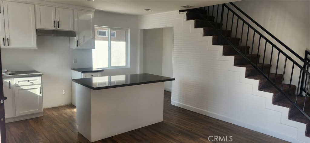 GREAT OPPORTUNITY TO PURCHASE A BRAND NEW 2025 FRESHLY BUILT PROPERTY IN THE HEART OF METROPOLITAN SOUTH LOS ANGELES WITH EASY ACCESS TO ALL MAJOR FREEWAYS AND TRANSPORTATION TO ALL MAJOR SPORTING VENUES, AIRPORTS, DOWNTON L.A, NIGHTLIFE, SHOPPING AND DINNING. THE PROPERTY CONSISTS OF 2 BUILDINGS, A 2 STORY SFR AND A ADU ABOVE A 2-CAR GARAGE WITH EXTRA PARKING AND YARD SPACE. THE FRONT SFR FEATURES A 2-STORY HOME WITH 3 BEDROOMS AND 3 BATHS 2 1 BEDROOMS AND BATHROOM DOWNSTAIRS, A MASTER BEDROOM UPSTAIRS, AND A JR MASTER BEDROOM UPSTAIRS, OTHER FEATURES INSIDE LAUNDRY HOOKUPS, QUARTZ COUNTERS, UP-TO-DATE AND CUSTOM KITCHEN CABINETRY, 2 FULL BATHS AND A COMMON 3/4 BATH WITH SHOWER DOWNSTAIRS, CENTRAL AIR CONDITIONING AND HEATING, TANKLESS WATER HEATER AND LEASED SOLAR PANELS WICH NEW NUYER WILL HAVE TO APPLY FOR. THE PROPERTY HAS BEEN BUILT WITH ALL UP-TO-DATE CALIFORNIA ENERGY EFFICIENT CODES. DOUBLE PANE WINDOWS, TILE AND LAMINATE FLOORING THROUGHOUT, TILED BATHROOMS, THE REAR ADU IS A SEPARATE STRUCTURE ABOVE THE 2 CAR GARAGE WITH A GATED 2 OPEN COMPACT CAR PARKING SPACES WITH ALLEY ACCESS TO PARKING AND GARAGE IT FEATURES 1 BEDROOM 1 BATH, CUSTOM CABINETRY WITH QUARTZ COUNTER TOPS TILED BATHROOM, LAMINATE FLOORING, CENTRAL AIR CONDITIONING AND HEATING SOLAR PANELS SEPARATE GAS AND ELECTRIC METERS.
