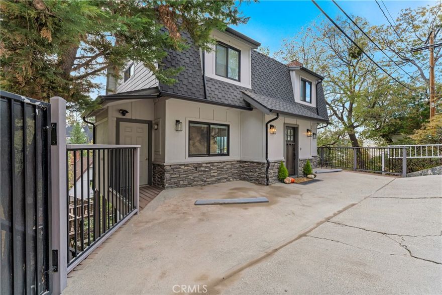 Just Listed Lakefront Opportunity of the Season!  This LEVEL entry lake home is completely remodeled head to toe with Beautiful lake views straight to village.  Enjoy the firework show right from your own deck.  The photos do not do the views justice and will only get broader as the tress drop leaves.  This property is completely set up for turn key occupancy with designer Crate and Barrel furnishings and accents intact. Short term rentals could be an amazing income source right from the start. All the rooms have a view! Light and bright with a great floor plan. There are three bedrooms up with an ensuite primary and an additional guest bath at lower level there is another ensuite bedroom with a spaciously sized family/game room and big screen TV.  New trex decking on both levels with new patio furnishings, all new paint, flooring, cabinetry, and new systems!  This truly is your opportunity for a turnkey experience!  The half double dock is available for additional in deep water and is accessed on easy to walk concrete staircase down to shoreline.

Super Clean and Won't last!  Best Lakefront Value on Market in it's range.