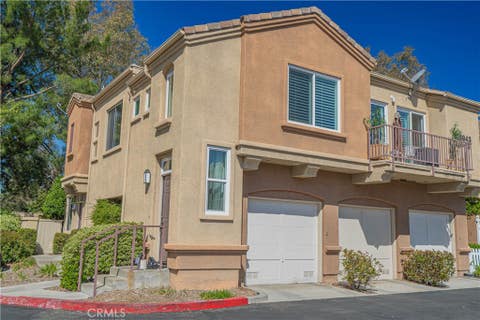 Photo of 26943 Hillsborough Parkway #25, Valencia, CA 91354 (MLS # SR26093125)