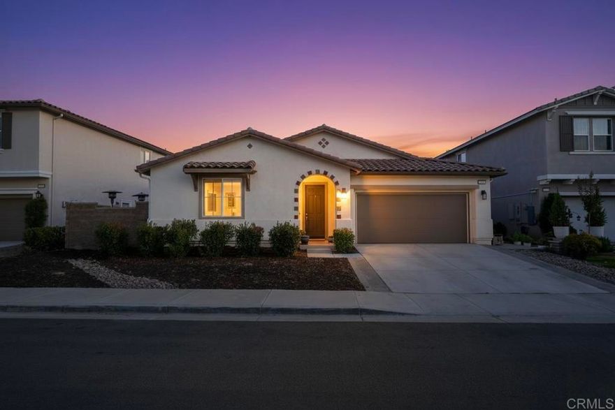 Welcome to Spencer’s Crossing, where modern elegance meets relaxed California living.  Come in and enjoy single-story living at its best! This energy-efficient 3-bedroom PLUS BONUS ROOM, 2.5-bathroom home is light, bright, and move-in ready. You’ll fall in love with its open-concept family room that flows seamlessly into the large kitchen with granite countertops and an expansive island, perfect for entertaining and family gatherings.  Step through the spacious entryway into a home that blends comfort, flexibility, and function, offering plenty of space to make it your own. Inside, you’ll find fresh NEW interior paint and NEW luxury flooring throughout, creating a modern and inviting atmosphere. An OPTIONAL room offers flexible use as a spare bedroom, den, or office, while two spacious bedrooms are conveniently located near a dual-vanity hall bath. The primary suite is a private retreat featuring a spa-like ensuite with soaking tub to unwind at the end of the day.  Step outside to enjoy low-maintenance landscaping, CUSTOM BUILT covered patio, and artificial turf with drought-resistant plants and fruit trees, creating the perfect space for relaxation and entertaining. The home also includes PAID SOLAR and a tankless water heater.  Located in the highly desirable Spencer’s Crossing community, residents enjoy access to The Oasis, an exclusive resort-style area with two pools, firepits, picnic and BBQ spaces, along with The Clubhouse, sports parks, dog parks, playgrounds, and scenic walking trails. All this, just 15 minutes from Temecula Wine Country, top-rated schools, and everyday conveniences along Winchester Road.  More than just a home, Spencer’s Crossing offers a lifestyle built on comfort, connection, and California charm.