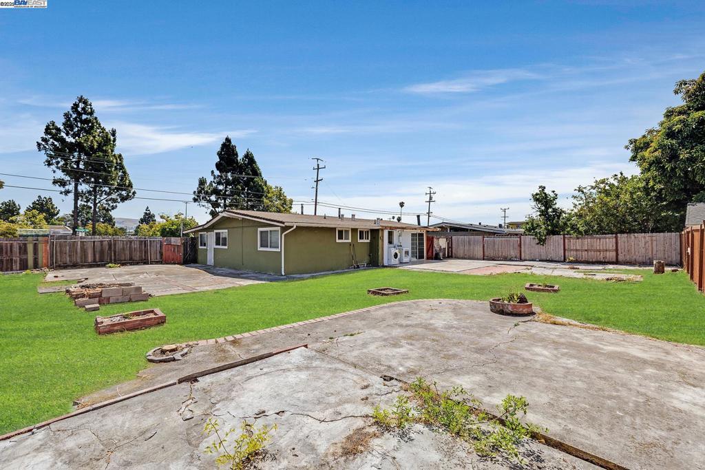 Incredible opportunity to own a home situated on a large flat, and highly versatile corner lot. This lot offers the potential for multiple access points, making it truly unique. The main house provides ample space for comfortable everyday living, complemented by a spacious driveway that can easily accommodate three additional vehicles, plus an enclosed garage. The expansive rear portion of the lot presents exciting possibilities; it can be partitioned with a fence to allow for storage of work equipment, and potentially even additional structures. This fixer-upper home is conveniently located near a commercial space corner and is just a few minutes from the San Mateo Bridge and freeway access. Properties with this kind of potential are a rare find on the market, so don't miss your chance to own this great home and see it today!