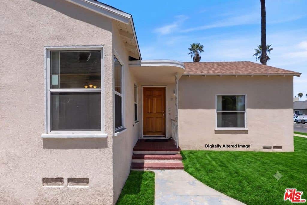 Photo of 4021 Degnan Boulevard, Los Angeles, CA 90008 (MLS # 26860067)