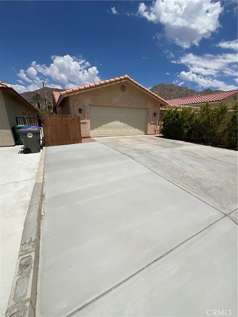 Photo of 53660 Avenida Herrera, La Quinta, CA 92253 (MLS # IV26132472)