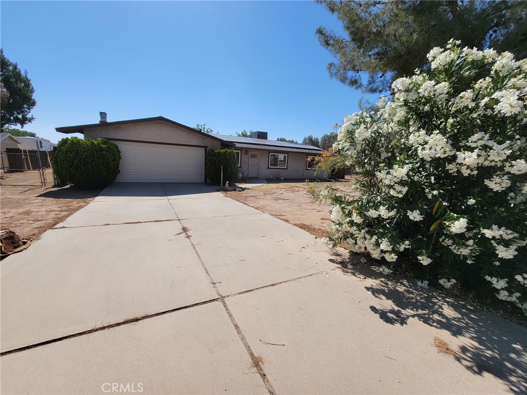 Welcome to your new home! This cozy and well-maintained 3-bedroom, 2-bathroom house is nestled in a quiet, family-friendly neighborhood in the heart of Hesperia. With a spacious layout and thoughtful touches throughout, this home offers comfort, convenience, and room to grow. Step inside to find a bright and open living area, a functional kitchen with plenty of cabinet space, and generously sized bedrooms, including a private primary suite with its own full bathroom. But the real gem? The oversized backyard — perfect for summer BBQs, birthday parties, or simply enjoying the High Desert evenings under the stars. Whether you're entertaining guests or relaxing with family, this outdoor space has you covered. Located close to top-rated schools, shopping centers, dining, parks, and easy access to major transportation routes, this home combines peace and privacy with everyday convenience.