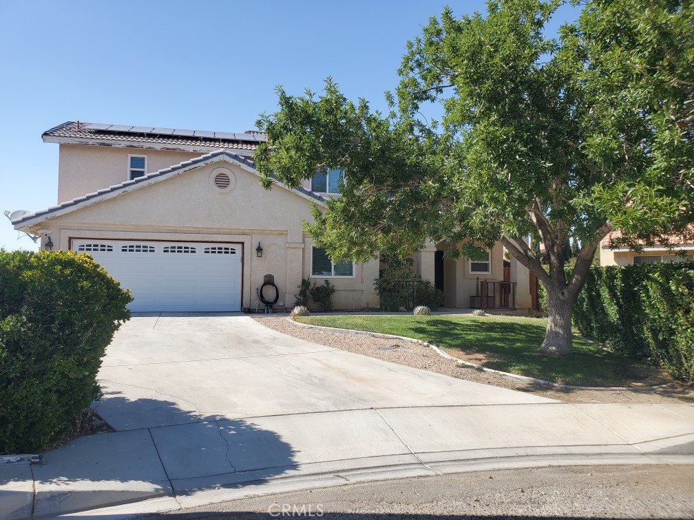 Welcome to This Beautifully Remodeled 2-Story Home in the Growing City of Adelanto * This Home has 3 Bedrooms, 2.5 Baths and a Bonus Room Downstairs That Can be Used as a 4th Bedroom * The Square Footage is 1,755 and Sits on a 13,650 Square Foot Lot * The Inside of the Home Was Painted Approx 2 Years Ago * The Luxury Vinyl Flooring and Upgraded Carpet is Almost 3 Years Old, But Looks Brand New * The Kitchen Has Been Remodeled with Natural Stone Backsplash with Brass Inserts and There is Under Cabinet Lighting * The Stainless Steel Appliances are 3 Years Old and Include a Gas Stove, Microwave and Dishwasher * There is Also a New Garbage Disposal and Farm Sink * New Dual-Pane Gas Charged Windows and Slider Help Keep the Home Cool in the Summer and Warm in the Winter * The Fireplace is Located in the Living Room for our Cool Autumn and Winter Months * There is a Remodeled Half Bath Downstairs and 2 Remodeled Full Baths Upstairs * The Master Bedroom Has 2 Custom Closets and Dual Sinks in the Attached Master Bath * There is LED Lighting Throughout the Home and the Vinyl Window Blinds are Approx 1 Year Old * The Backyard is Enormous with a Very Large Attractive Stamped Concrete Covered Patio * There is Access to the Backyard Through the Side Gate that is Large Enough for Cars to Pass Through and has Ample Parking in the Yard for Holiday Entertaining or Parties * The Yard has Block Wall on 3 Sides and a Wooden Fence on 1 Side * There is a New Wireless Garage Door Opener or Can Also Be Used with Remote * The Owner has Installed Solar on the Property and it Has Been Paid!!!!!