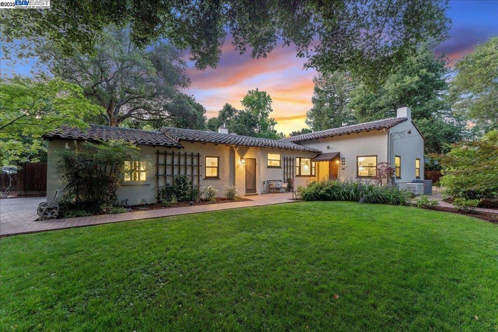 Welcome to 405 Kingsley Ave—an elegant, updated home in Palo Alto’s coveted Professorville. Set on a serene, tree-lined street and corner lot. This 2BD/2BA residence offers approx. 2,100 sq ft of beautifully refreshed living space. A flexible bonus area offers 3rd bedroom or in-law suite with a separate entrance. The sunny living room with a cozy fireplace flows into the dining room and a remodeled kitchen with quartz countertops, modern cabinetry, and stainless-steel appliances. Charming flex room off the living room. Separate laundry room with new washer & dryer. Refinished hardwood floors, luxury waterproof laminate, designer lighting, and upgraded electrical add stylish comfort throughout. Enjoy a fully fenced backyard and a lush front garden-ideal for relaxing or entertaining. Additional features include a large basement, two-car garage, and ample driveway parking. Just a short stroll to University Ave, Stanford, and top tech campuses. Easy access to 101 and award-winning Palo Alto schools. Privacy, beauty, and location—this is Silicon Valley living at its finest.
