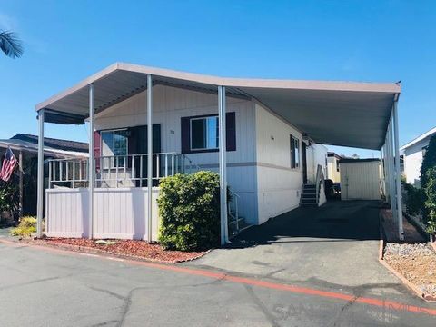 Photo of 400 N Melrose Dr #33, Vista, CA 92083 (MLS # 260010634SD)