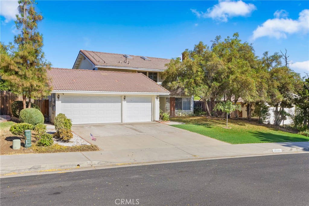 Welcome to Sunnymead Ranch! This spacious 4-bedroom, 2.5-bathroom home with a versatile bonus room is located just minutes from Sugar Hill Elementary School. Offering great curb appeal with mature trees, a large driveway, and a 3-car garage, this home is perfect for those who need extra parking and love a warm, welcoming exterior. Inside, you’ll be greeted by soaring ceilings and a grand staircase, setting a dramatic tone. To the right, the living room features a cozy fireplace and a large window that fills the space with natural light. The kitchen has been beautifully updated with newer cabinets and countertops, and charming plantation shutters that extend into the adjoining family room—ideal for relaxing, entertaining, or converting into a formal dining space. Throughout the home, you’ll find recessed lighting, ceiling fans, and plenty of windows that allow for abundant natural light. In addition, this property comes with a paid-off solar system, allowing you to enjoy energy savings and avoid high electric bills. Downstairs also includes a bonus room that can serve as a home office, gym, or potential fifth bedroom, along with a convenient laundry room and half bathroom. Upstairs, you’ll find four generously sized bedrooms. The primary suite is a true retreat, offering enough space for all your favorite furniture, a private balcony perfect for enjoying your morning coffee, and an en-suite bathroom with dual sinks, a walk-in shower, and an oversized closet. The three additional upstairs bedrooms are spacious and versatile, perfect for family members or guests. Step outside to a backyard that features a lattice patio cover and plenty of space to create your dream outdoor oasis. This home is part of the highly desirable Sunnymead Ranch Homeowners Association, which offers an impressive array of amenities including a private gated clubhouse, swimming pool, spa, sports courts, pickleball court, playgrounds, BBQ areas, picnic spaces, and even a lake where you can go fishing. With its prime location near top-rated schools, shopping, and easy highway access—and the added bonus of a paid-off solar system—this home offers both comfort and value in a beautiful community setting.