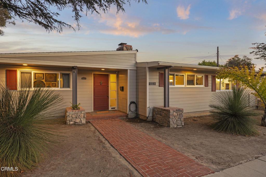 Step into a beautifully preserved mid-century gem located in one of Ventura's most cherished historic neighborhoods--Cunnane, named after Dr. Thomas E. Cunnane, a beloved local physician who began serving the community in 1899 and left a lasting legacy of care and connection.This single-story 3-bedroom, 2-bath home is rich with iconic design details, from striking brass hardware and an abundance of custom shelving and hidden built-ins that perfectly reflect the timeless functionality of mid-century architecture. A bonus room off the kitchen offers flexible use, professional or even a zen space.Natural light pours into the dining area through massive picture windows, creating a seamless indoor-outdoor feel. The hall bath is a pristine time capsule, maintaining its original character, while the primary bedroom features a modern mini-split for year-round comfort. Dual-paned windows throughout provide energy efficiency without compromising the home's charm.Set on a spacious lot, the property boasts three distinct yard areas, two patios, raised garden beds, decomposed granite landscaping, and a detached garage. A wide, gated side yard offers potential to add an ADU or park an RV, making this home as practical as it is beautiful.With deep roots in Ventura's history and timeless mid-century design, this home offers a rare blend of character, comfort, and opportunity.