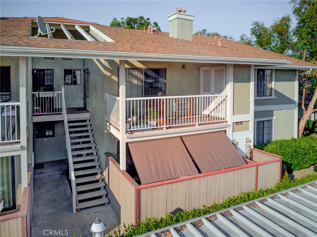 Welcome to Village homes!! Step into this beautifully upgraded second floor condo located in a secure, gated community in the heart of Tustin. This incredible unit features vaulted ceilings with lots of natural light. The living room has a cozy gas fireplace. Dining area is right off of the kitchen which makes it easy to entertain guests. In-unit stackable laundry, and a tankless water heater on the private patio. Enjoy peace of mind with a dedicated parking space and HOA-covered amenities, including a sparkling pool, relaxing spa, clubhouse, and community upkeep. The home offers a perfect blend of comfort and convenience with easy access to major freeways, top-rated schools, local parks, and popular destinations like The District and Tustin Market Place. Whether you’re a first-time buyer, downsizing, or investing, this home checks all the boxes for easy Southern California living.