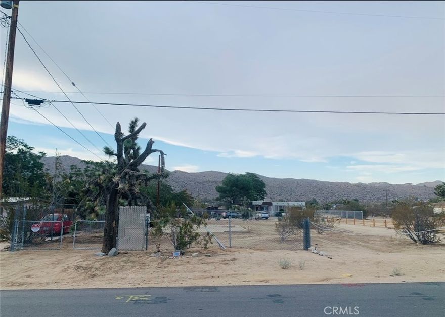 Build your dream home on this 7,900± sq ft residential lot located on a quiet street in Yucca Valley. This level, buildable parcel features a pre-existing concrete slab foundation, offering a valuable head start for future construction. Utilities including water, sewer, and electricity are available at the street for convenient hook-up ( Electric is Free to Hookup )(buyer to verify).

Situated in an established residential neighborhood with nearby homes, this property offers a peaceful high-desert setting while remaining close to local shopping, dining, schools, and services. Enjoy easy access to outdoor recreation and the natural beauty of the surrounding desert, including proximity to Joshua Tree National Park.

This is an incredible opportunity to purchase a residential lot with infrastructure already in place in a desirable Yucca Valley location. Opportunities like this are rare and will not last long.
