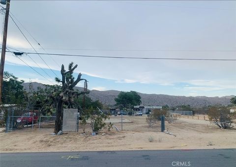 Photo of 56650 Antelope Trail Trl, Yucca Valley, CA 92284 (MLS # SW25281283)