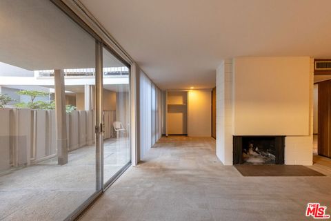 Photo of 833 Moraga Drive #6, Los Angeles, CA 90049 (MLS # 25618929)