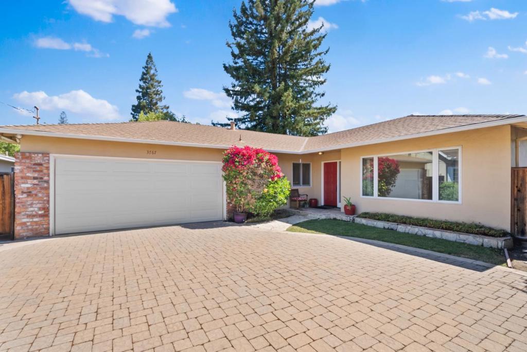 Tucked away on a peaceful Barron Park cul-de-sac, this elegantly updated 4-bed, 2-bath home offers 1,922 sq. ft. of light-filled living on a 7,350 sq. ft. lot. A long private driveway welcomes guests, while rich oak hardwood, marble, and premium fixtures showcase timeless quality. Expansive windows fill the open floor plan with natural light, where the inviting fireplace, chef-inspired kitchen, and seamless indoor-outdoor flow create an ideal setting for both relaxation and entertainment. Outside, a private sanctuary awaits lush year-round blooms, mature trees, a spacious entertainers deck, and artful hardscaping. Stroll to Bol Park or take a short drive to Foothills Park for hiking, fishing, or picnics. Minutes to Stanford, California Avenue, Caltrain, and world-class dining and shopping, with quick connections to 101, 280, and Foothill Expressway. Top-rated schools nearby (buyer to verify). A rare turnkey gem where tranquility, elegance, and convenience meet in one of Palo Alto's most sought-after neighborhoods.