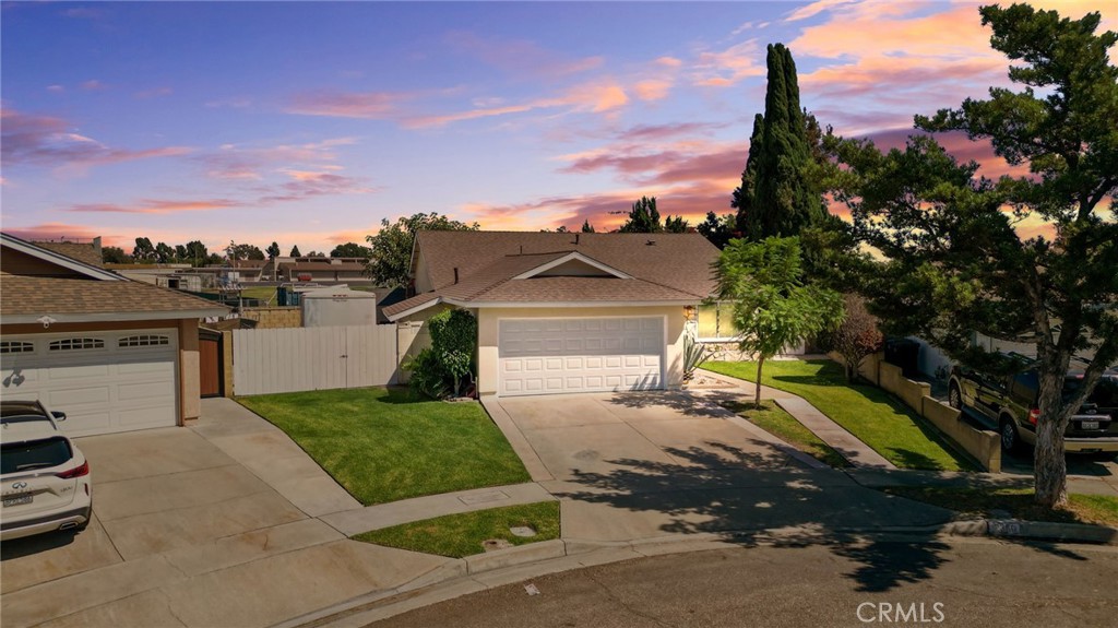 Nestled in one of Cerritos' most desired neighborhoods, this lovingly maintained 4-bedroom, 2-bathroom home on a Huge Lot with plenty of parking for your RV, Trailer, or Boat is offered for the first time in over 20 years. Located in a tranquil cul-de-sac directly across from Cerritos High School and 1 block away from Elliott Elementary School. The home harmoniously combines comfort, functionality, and a prime location. The spacious, vaulted living room is perfect for your guests. Dual-pane windows throughout for added comfort. Step into the Dining Area, featuring a cozy fireplace, and seamlessly connected to a generously sized kitchen equipped with stone countertops and ample cabinet space. One of the bedrooms, currently utilized as a home office, offers flexibility to accommodate various needs. Step outside to a private backyard perfect for entertaining, ensuring year-round enjoyment. The backyard patio area, featuring an enclosed patio, creates an ideal setting for entertaining guests or enjoying peaceful evenings. The primary suite offers a serene escape, boasting a spacious closet and an en-suite bathroom with a Shower, combining privacy and convenience. The peaceful front yard features an automatic sprinkler system and landscaping with mature Agave, enhancing the home's curb appeal and facing a tree-lined street. NEW ROOF installed in 2024, Copper Plumbing throughout, Newer Exterior Paint, Newer AC system & Newer Flooring. Living in this desirable neighborhood means access to top-rated schools within the esteemed ABC Unified School District, ensuring quality education for all ages. Commuting is a breeze with proximity to the 91 and 605 freeways, facilitating effortless travel to the Los Angeles or Orange County areas. Additionally, a plethora of shopping and dining options are available nearby, including Trader Joe's, Cerritos Towne Center, and Cerritos Mall, which offer a variety of retail and culinary experiences. This home combines a functional layout, amenities, and an unbeatable location, making it an exceptional opportunity for a family seeking a place to call home.