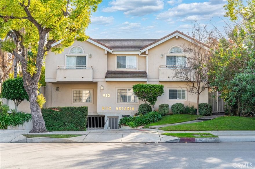 Welcome to this well-maintained three-bedroom, three-bath condo located on a quiet yet convenient residential street in Arcadia. This home features a custom built wine cellar and a custom built library with rolling ladders. It is within walking distance to hospitals, supermarkets, restaurants, good schools, and parks. Built in 1997, the home offers a functional layout with quality construction and select upgrades throughout. The main level features a comfortable living room with fireplace, a defined dining area, and an open kitchen with custom cabinetry. All three bedrooms are located upstairs, including a spacious primary suite with a walk-in closet and additional storage. The home includes several custom touches such as a built-in entertainment center, library shelving with rolling ladder, decorative wall finishes, and a temperature-controlled wine cellar. The private outdoor space provides room for casual entertaining with a slate patio, built-in barbecue, and fountain feature. Conveniently located near Arcadia schools, Santa Anita Mall, parks, library, and dining options, this property offers a solid blend of comfort, character, and location in an established neighborhood.