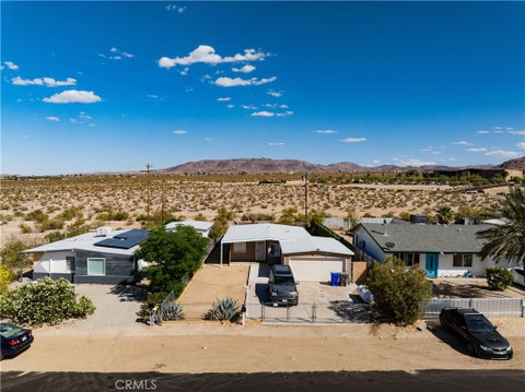 Photo of 73761 Serrano Drive, 29 Palms, CA 92277 (MLS # JT26095341)