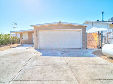 Photo of 73761 Serrano Drive, 29 Palms, CA 92277 (MLS # JT26095341)