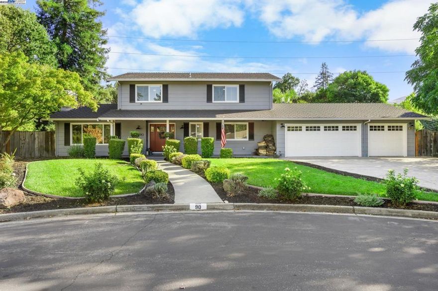Open House Sat/Sun 2-4pm!  Beautifully updated 4-bedroom, 3-bath home on a quiet cul-de-sac in the sought-after Brookside neighborhood. With 2,509 sq. ft. of living space on a generous 14,950 sq. ft. lot, this home offers the perfect blend of comfort and convenience. The bright floor plan, featuring hardwood floors throughout the downstairs area, includes a spacious living room and a family room, both with raised gas fireplaces, as well as a formal dining area. The gourmet kitchen features ample counter and storage space, stainless steel appliances, a sitting area, and views of the backyard. A bedroom and full bathroom downstairs make it ideal for entertaining guests or a home office. The laundry room, featuring a sink and cabinet space, leads into the large 3-car garage, which completes the main level. Upstairs, the primary suite boasts a spacious layout, a spa-like bath with dual sinks, a large shower stall, and a separate vanity area. Two additional bedrooms share a full bath. The expansive backyard is a true retreat, featuring a sparkling blue pool, raised garden beds, and plenty of open space. Just minutes to downtown, top-rated schools, and the Iron Horse Trail, this place has it all. Welcome Home!