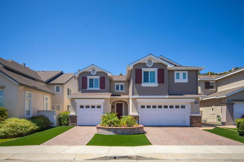 A rare opportunity in the sought-after Westport community of Stonecrest Village, this 3-bedroom plus loft, 2.5-bath home offers both comfort and privacy. Backing up to a scenic hillside with no homes behind you, the setting provides a peaceful retreat rarely available in this central San Diego neighborhood. The updated kitchen is the heart of the home, featuring a large center island, quartz countertops, stainless steel appliances, gas cooktop, breakfast nook, and an adjoining family room with a cozy fireplace. Upstairs showcases real wood floors throughout, an open loft that can easily be converted to a 4th bedroom, and a spacious primary suite with vaulted ceilings, private balcony, walk-in closet, and spa-like bath with soaking tub, dual vanities, and walk-in shower. The backyard is beautifully manicured with lush landscaping, artificial turf, and a partially covered patio—perfect for relaxing or entertaining. Stonecrest Village offers resort-style amenities, including two pools with spas, a fitness center, tennis and pickleball courts, clubhouse, parks, playgrounds, and scenic walking trails—all with quick freeway access and just minutes from shopping, dining, and the beach.