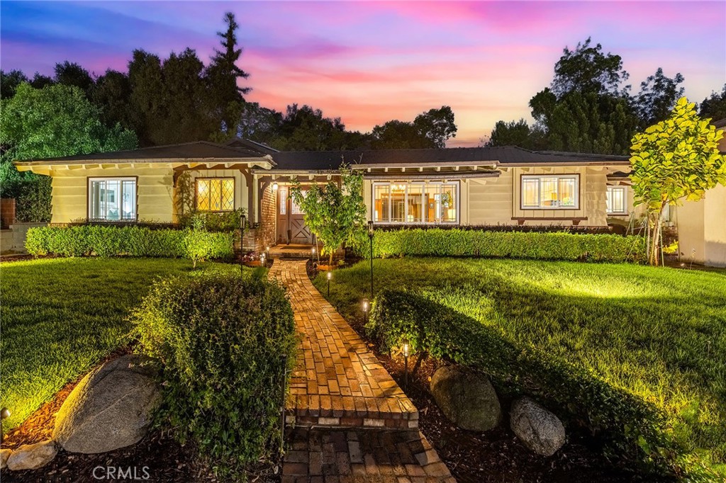 Gorgeous North Arcadia Ranch-Style Pool Home with Guest House.
Tucked away on a peaceful Foothill cul-de-sac, this charming home offers the perfect blend of space, comfort, and convenience. Situated on nearly 17,000 sqft. lot, the property provides 3,137 sqft. of living space, including a permitted 507 sqft. guest house, making it ideal for large or multi-generational families.
The main house features 4 bedrooms and 4 bathrooms, including a spacious primary suite with dual vanities, spa tub, and stall shower. Expansive living and family rooms, each with hardwood floors, cozy fireplaces, and direct access to the backyard, create inviting spaces for entertaining and everyday living. The guest house includes 1 bedroom, 1 bathroom, and a kitchenette—ideal for visitors, extended family, or a private office.
The kitchen offers ample cabinet space, granite countertops, and a large center island that flows into the bright dining area—perfect for gatherings and dinner parties.
Step outside to a resort-style backyard with a covered patio, sparkling pool and spa, lush landscaping, and fruit trees—an entertainer’s dream.
Additional features include central AC, a fully owned solar system, and an attached garage with EV charging.
Located in the prestigious Arcadia School District, this home is walking distance from Foothills Middle School, and minutes away from shopping plazas, hiking trails, Santa Anita Race Track, and the LA County Arboretum.
This North Arcadia gem offers space, lifestyle, and location—all in one exceptional property.
