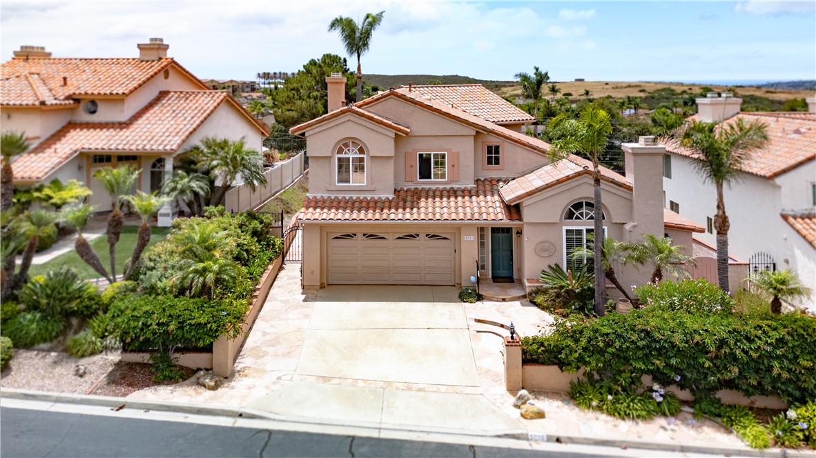 Welcome to your dream home in the special gated community of Ocean Hills in Oceanside! This beautifully maintained 3-bedroom, 2.5-bath home offers views, views, views with stunning open vistas and a peek of the ocean in the distance — the perfect backdrop for everyday living or entertaining with sunset evenings. Enjoy the ultimate in location, location, location, nestled on a quiet cul-de-sac just minutes from the beach, shopping, dining, and top-rated schools. The home features an open floor plan filled with natural light, flowing seamlessly to a spacious walk-out deck and an expansive, flat backyard — ideal for a future pool or lush garden retreat. Inside, you’ll find updated bathrooms with modern finishes, warm, inviting tones throughout, and a cozy yet stylish vibe that feels like home the moment you walk in. The spacious 2-car garage, ample storage, and thoughtfully designed layout add to the comfort and convenience of this exceptional property. Don’t miss this rare opportunity to own in one of Oceanside’s most desirable communities!