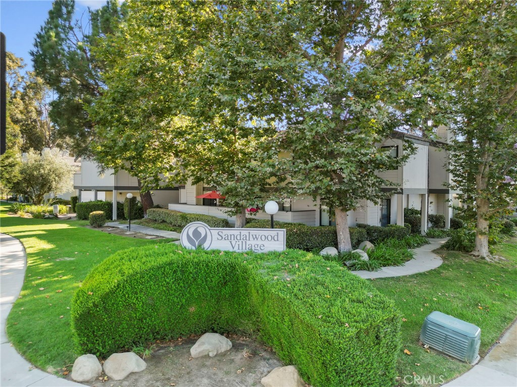 Stylishly Updated End-Unit Condo with Sunset Views in East Simi Valley’s Sandalwood Community...Welcome to this updated 2 bedroom, 1.5 bath end-unit condo with attached 2-car garage is located at the end of a quiet cul-de-sac in the desirable Sandalwood Community of East Simi Valley. Offering 1,025 sq ft of living space, this home combines comfort and style with vaulted ceilings, an open layout, and a private balcony with amazing sunset and mountain views. The interior has been tastefully refreshed with vinyl flooring, newer carpet, smooth ceilings with recessed LED lighting, fresh paint, and an interior laundry room. The kitchen showcases butcher block countertops, refreshed cabinetry with new hardware, a water filtration system, and is open to the bright and airy living space with a dual fuel fireplace. Both bathrooms have been upgraded with new toilets, while the main bath features a new vanity, beautifully tiled shower, and soaking tub. Additional highlights include spacious bedrooms with ample closet space and an airy floor plan filled with natural light and thoughtfully designed shelving to display books, photos, and your favorite decor. The Sandalwood community offers 2 sparkling pools, 2 spas, walking paths, and beautifully maintained grounds, all while being conveniently close to shopping, dining, parks, schools, and freeway access. The HOA fee generously includes water, trash, and exterior maintenance, including pools and spas. With its prime end-unit location and thoughtful upgrades, this move-in-ready home is a must-see!