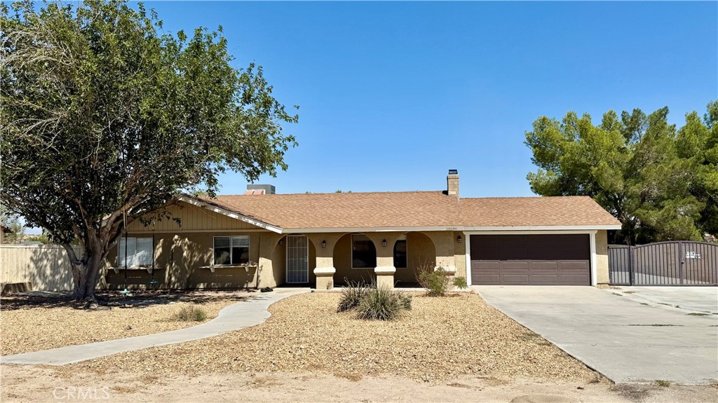 Beautiful single story home located in the desirable neighborhood in Victorville. This charming home features 3 spacious bedrooms and 2 full bathrooms, with stylish laminate flooring throughout. The modern kitchen is equipped with sleek quartz countertops and a large island, offering plenty of space for cooking and entertaining. Step outside to a covered patio in the backyard—perfect for gatherings and outdoor enjoyment.