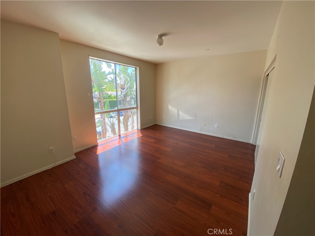 This spacious 2 bedroom, 2 full bath unit is ready for move in. Large, spacious floor plan with master suite featuring walk in closet. The unit features granite counter tops, spacious kitchen, custom laminate flooring and washer dryer hookups. This unit is turn key and ready for immediate showing. It comes with two parking spaces located in a gated subterranean parking garage with remote access for two cars. Unit includes 2 tandem parking spaces in a controlled access parking structure. Priced to sell. Schedule your appointment.