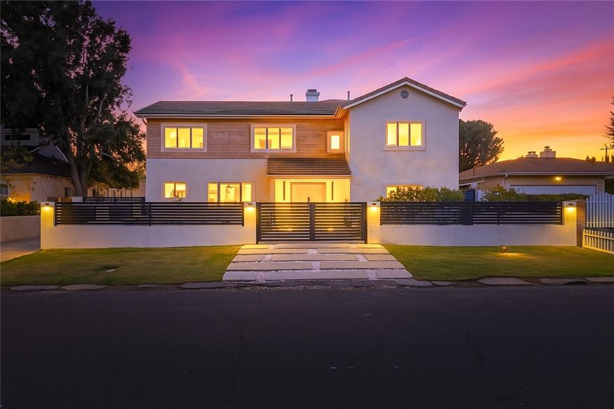 !!! WOW BIG PRICE REDUCTION!!! This unique and stunning Valley Village house is a standout luxury property with seven bedrooms and six bathrooms, 2 Master Suites, spanning nearly 5,000 square feet on a spacious 9,450 square foot lot. The home's previous listing highlights a blend of classic modern details, dramatic high ceilings, LED custom electric fireplaces, and an expansive open floor plan. The chef’s kitchen features a striking porcelain island, designer cabinetry, state-of-the-art appliances, and elegant porcelain countertops and backsplash. Voluminous living and family rooms transition to a stylish tropical backyard with a custom barbecue, sparkling pool, and spa—ideal for entertaining or private relaxation. This luxury gem exemplifies high-end living with recent upgrades that cater to both modern efficiency and timeless comfort, making it one of Valley Village’s most enviable estates.
Upgrades and Features
• Recently renovated with modern fixtures and finishes, including LED accent lighting and custom cabinetry throughout.
• New porcelain surfaces in the kitchen and bathrooms, plus skylights and upgraded lighting features in the primary suite and bathrooms. 
• The primary suite offers a private balcony overlooking the backyard, double walk-in closets, and a new spa-inspired bath with dual sinks, soaking tub, and large shower.
• Multiple ensuite bedrooms provide comfort and privacy for families or guests, and the open layout enhances natural flow through living spaces.
• The backyard was significantly upgraded with a custom pool, spa, barbecue station, and tropical landscaping for an entertainer’s paradise. 
• Includes a two-car garage, convenient access to top-tier schools, shopping, and neighborhood attractions.
• The home is positioned in a serene, tree-lined residential pocket renowned for privacy, elegance, and proximity to Burbank Boulevard’s school district.