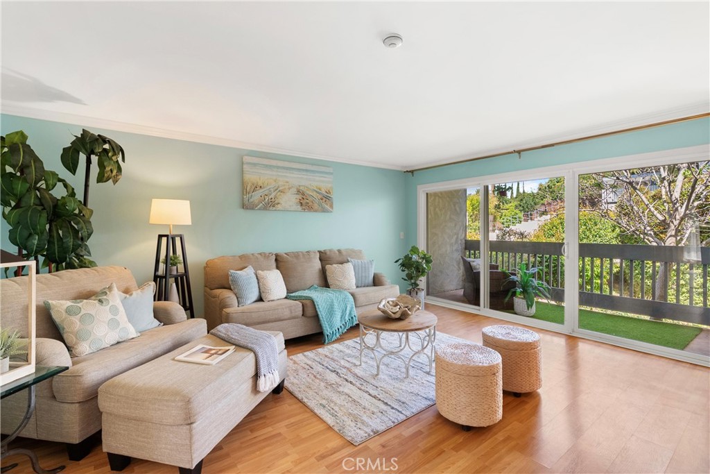 Bright & Private Condo in Brookside Village Location. Welcome to this spacious 975 sq ft, 2-bedroom, 2-bathroom first-floor end-unit condo in the heart of desirable Redondo Beach. This condo offers a true sense of retreat, less than a mile from Redondo Beach & Pier—an open-concept living area with stylish, durable laminated flooring and a remodeled kitchen and bathrooms.
Large windows and sliding glass doors fill the space with natural light and lead to a charming balcony, perfect for morning coffee or dining al fresco.
The kitchen features wood cabinetry, granite countertops, stainless steel appliances, a new oversized stainless sink, and storage, including a dishwasher, an electric range, and a refrigerator. The primary and additional bedrooms are spacious and light-filled, offering versatile living options. The bathrooms have been beautifully updated for modern comfort and style.
Two assigned parking spaces are conveniently located just steps from the unit, along with a personal storage cabinet and a large private storage room.
This condo is ideal for beach lovers, just minutes away from South Redondo Beach and the vibrant shops and dining of Riviera Village. Enjoy resort-style living in Brookside Village with amenities including two pools, sauna, tennis courts, clubhouse, well-equipped gym, and rec room with billiards. Located directly across from Alta Vista Sports Park and Redondo Beach Community Gardens, this coastal gem is the perfect blend of modern beachside living and serene community charm.