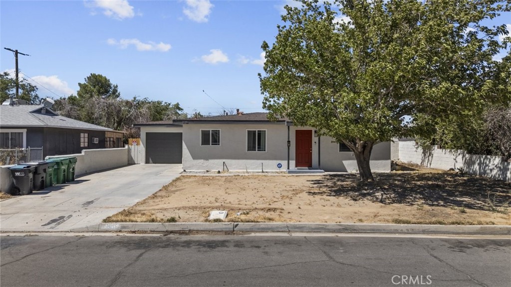 Welcome to 1135 W Pillsbury St, Lancaster, CA 93534, a beautifully remodeled ranch-style residence offering comfort, charm, and potential in a quiet neighborhood. This property features 3 bedrooms, 1 full bath, and a living space of 936 SqFt. Enjoy a chef-inspired kitchen with shaker cabinets, quartz countertops, and stainless steel appliances, perfect for entertaining and daily living. The luxurious full bathroom is complete with a porcelain tile shower, modern vanity, and contemporary fixtures. This home also offers a spacious, flexible backyard, ideal for future expansion. The 1-car garage has been upgraded with a new door and opener, adding functionality and storage convenience. With no HOA or Mello-Roos fees, this home offers excellent financial flexibility. Located in Lancaster, it's in close proximity to local schools, a shopping mall, and restaurants.