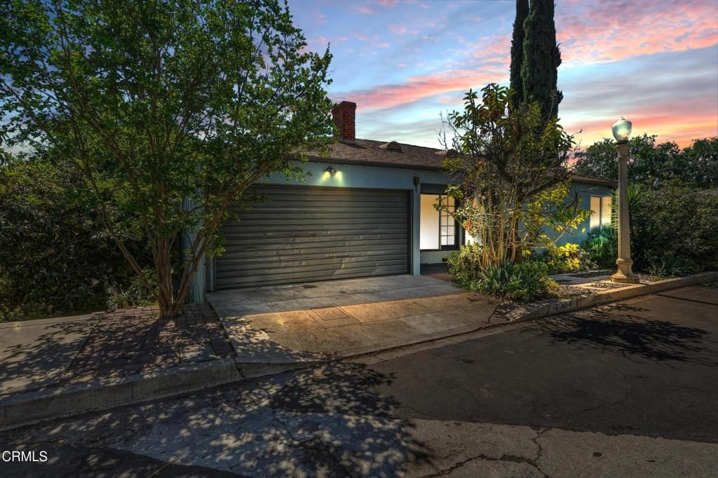 Photo of 3666 Roderick Road, Los Angeles, CA 90065 (MLS # P1-26398)