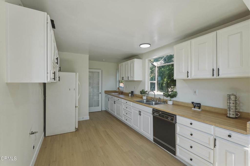 Photo of 3666 Roderick Road, Los Angeles, CA 90065 (MLS # P1-26398)