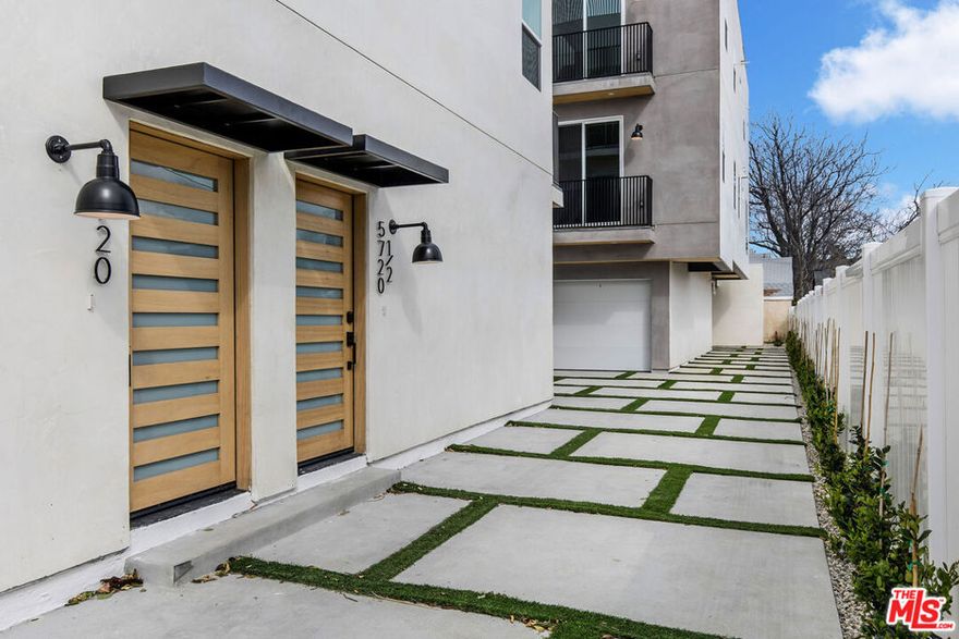 Newer construction townhome located in the heart of North Hollywood offering exceptional privacy, high-end finishes, and abundant natural light throughout. This spacious 2-bedroom residence features an open and modern floor plan ideal for entertaining, a fully equipped kitchen with premium appliances, large bedrooms with walk-in closets, private balconies, and en-suite bathrooms, plus a stunning private rooftop deck perfect for outdoor living. Situated in a secure building within a walkable and very safe neighborhood close to dining, shopping, and entertainment. No on-site parking, but ample street parking is available.