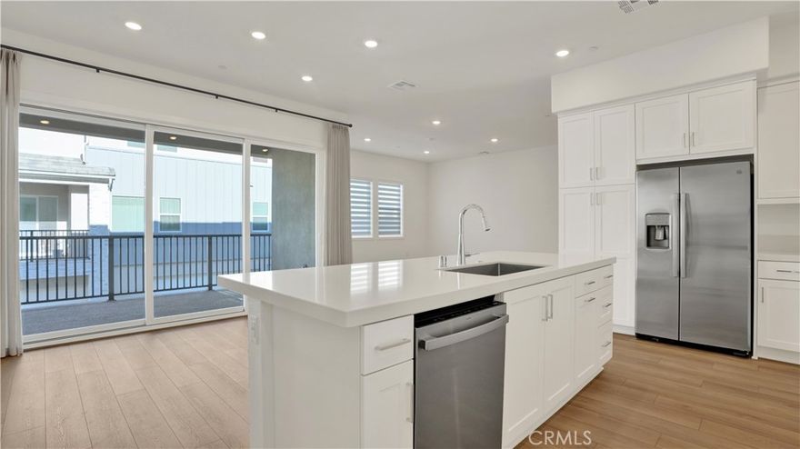 Welcome to this brand-new construction home in Great Park, Irvine, located in the highly desirable Luna Park community.  This modern residence offers sleek, open concept living with abundant natural light, expansive windows, and a large sliding door that seamlessly connects the living room, dining area, and kitchen. Step outside onto the spacious private deck, perfect for morning coffee, outdoor dining, or relaxing after a long day.  the main level includes a bedroom and full bathroom, ideal for guests, multigenerational living, or a home office. Upstairs, newly carpeted stairs lead to the primary suite, secondary bedrooms, and a separate laundry room for added convenience.  Additional highlights include a two-car garage with direct access, brand new epoxy flooring, and a Tesla charger, perfectly suited for today's lifestyle.  The home also features solar offering energy efficiency and lower utility costs.  Enjoy proximity to premier Great Park amenities, award winning Irvine Unified School District schools.  Conveniently located near the Irvine Spectrum Center for shopping, dining and entertainment, as well as the brand-new Wild Rivers water park and City of Hope Hospital.  Easy access to major freeways and John Wayne Airport makes commuting simple. Don't miss this rare opportunity to lease a brand-new home in one of Irvine's most sought-after neighborhoods. **Hurry this won't last"**